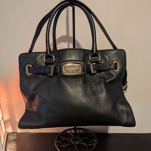 Michael Kors Black Leather Satchel with Gold Plaque